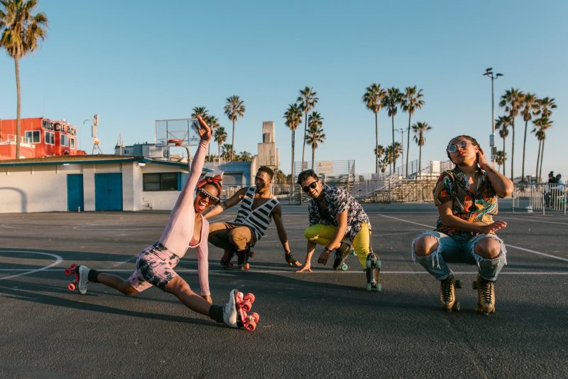 group of people wearing roller skates