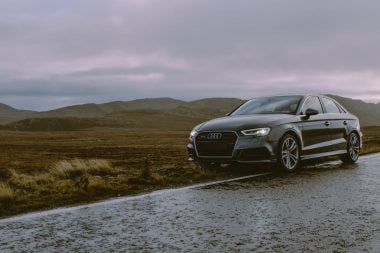 photo of black audi parked on roadside