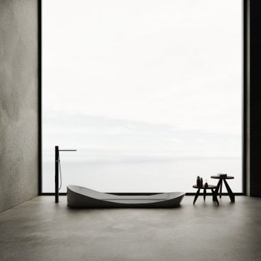 minimalistic bathroom with a tub in the floor